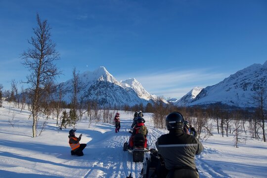 snowmobiling in lyngen alps mountains in tromso Norway