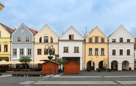 Traditional pastel-colored burgher houses lining Marianske Square in Zilina, Slovakia. Elegant facades, arcades, steep gabled roofs, and preserved medieval architecture showcase the charm of the city'