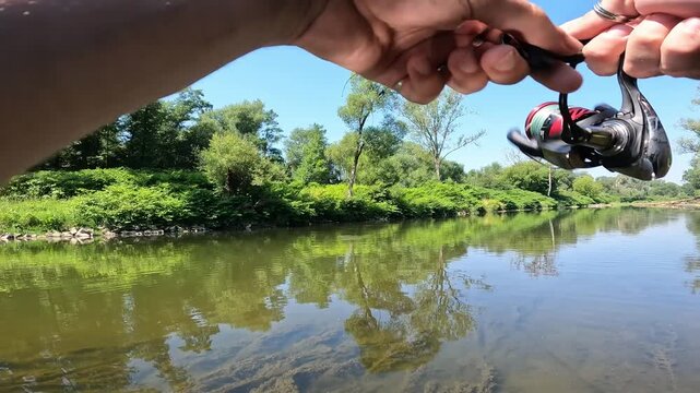 POV angling: Small European Chub (Squalius cephalus) fighting on the surface in a summer river