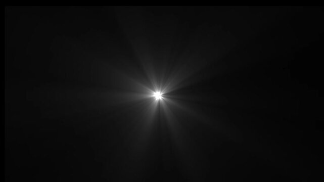 Volume Light from Top in the Dark Seamless. White Lamp Rays Shining on Black Background with Flying Dust Particles Looped Animation. Design Element for Overlays.