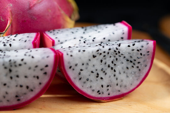 Fresh Dragon Fruit on Wooden Plate