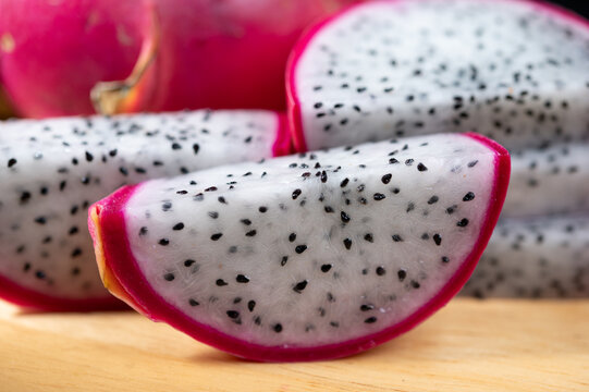Fresh Dragon Fruit on Wooden Plate