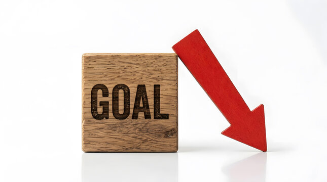 Business goal failure concept | Red arrow pointing down near goal word | Missing targets and objectives representation | Financial decline and poor performance metaphor