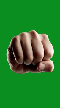 Close up of a human hand clenched in a tight fist against a solid bright green background