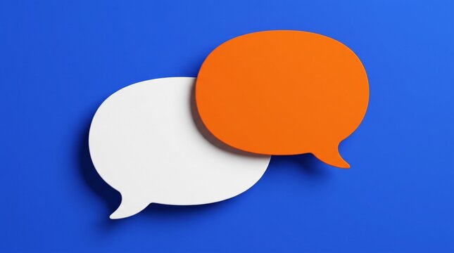 One white and one orange speech bubble icons placed on a vibrant blue background to represent communication dialogue conversation chat message and social media interaction concept
