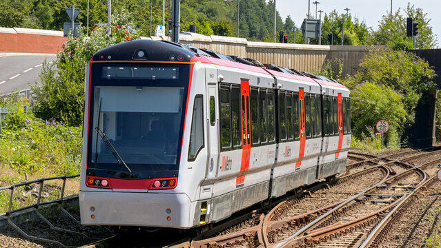 Taffs Well, Rhondda Cynon Taf, Wales, UK - 15 July 2026: Transport for Wales Class 398 Citylink tram train at Taffs Well railway station in south Wales. The train is manufactured by Stadler