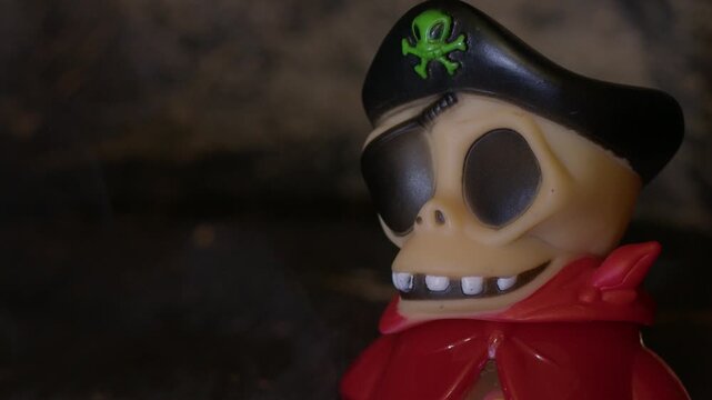 Qawra, Malta - 30.09.2024 - Spooky pirate Halloween candy packaging figure Woogie brand with light changing and smoke