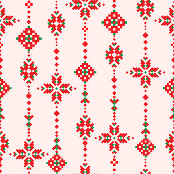 Christmas seamless pattern pixel Nordic folk embroidery  geometric ornaments in red, green and white. Christmas traditional festive textile vector background ethnic motifs for fabric design, vector