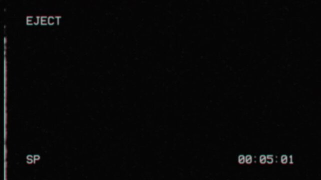 Retro vhs eject screen with glitchy timecode and analog noise
