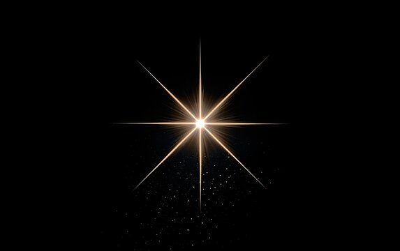 Radiant bright starburst emanating light on a dark background with small particles