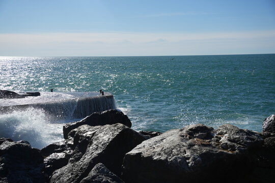waves crashing on rocks