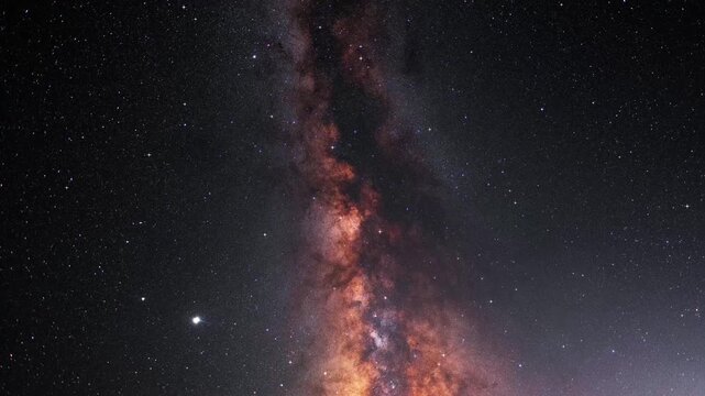 Colorful bright Milky Way galaxy on the starry sky.