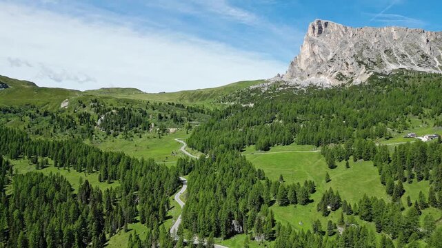 Giau Pass drive with mountains in Italy Dolomites by drone
