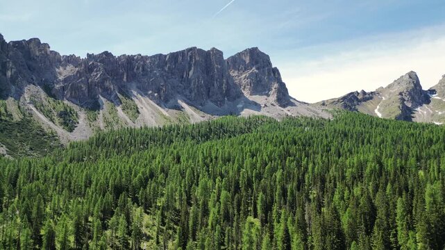 Giau Pass drive with mountains in Italy Dolomites by drone