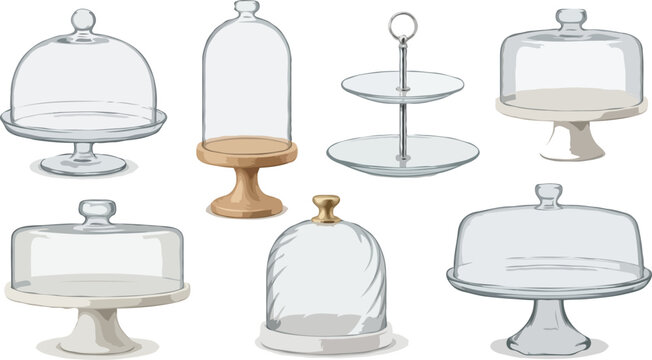 Elegant glass cake cloches and dessert stands on display. Clear glass food domes and cake pedestals for stylish presentation.