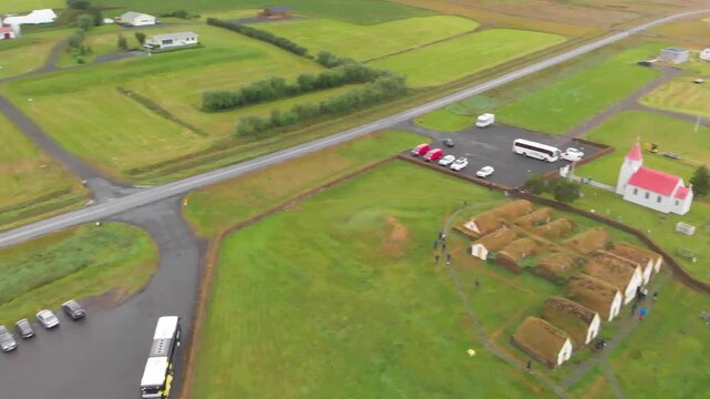 Aerial view of traditional Icelandic village and red church