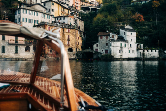 Wooden Boat Approaching Como Lakeside