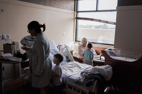 Family Visiting Newborn in Hospital