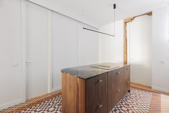 Kitchen island back panel with walnut drawers and silver handles
