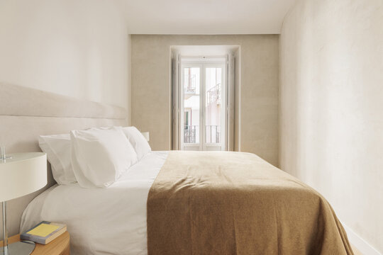 Modern bedroom with open balcony
