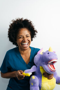 Dentist Brushing Dragon Puppet Teeth