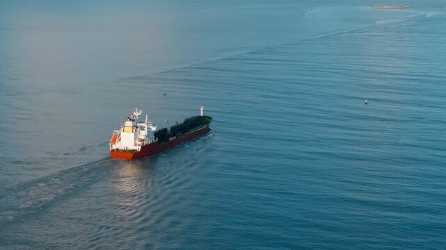 Liquid cargo tanker underway at sea carrying chemical products. Maritime transport for industrial chemicals and global trade routes