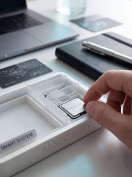 Hand protecting ai security chip in smart system with processor labeled protected marked security modern