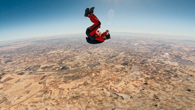 Freefall acrobatics high above the countryside