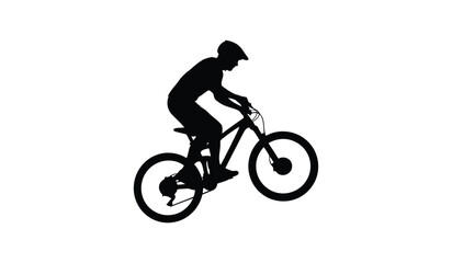 Fototapeta premium Mountain Biker Lifting Front Wheel Action Silhouette