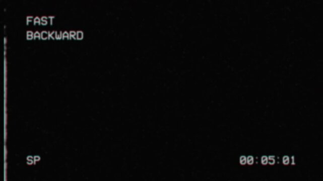 Retro vhs rewind screen with fast backward text and timecode