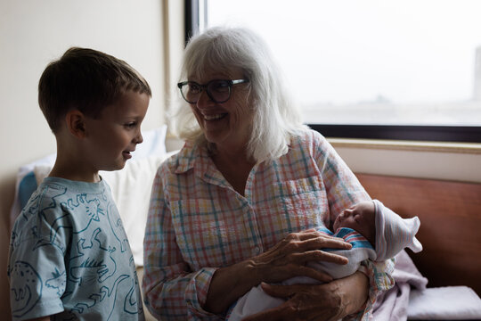 Grandmother Sharing Newborn Joy