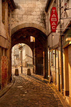 Morning sunlight in old French town.