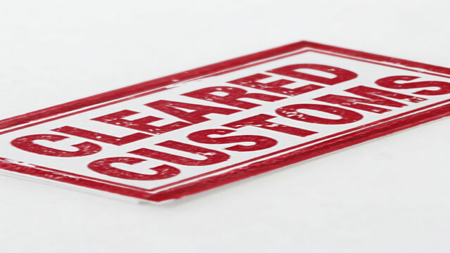 Cleared customs stamp on white background, shipping and logistics concept.