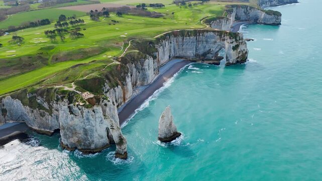 Etretat on Normandy coast, France, featuring famous natural arch and recognizable seaside landscape