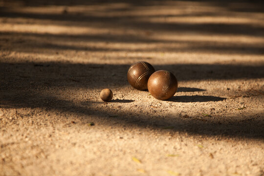 Petanque balls in sunlight