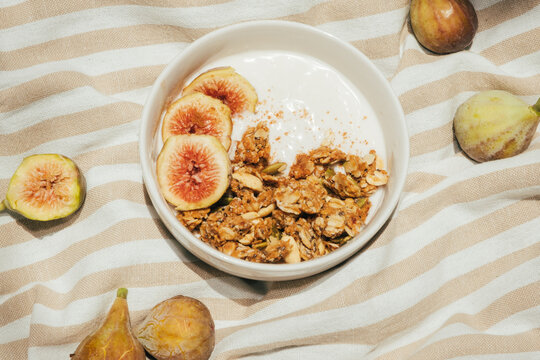 Vegan yogurt breakfast with fresh figs and granola