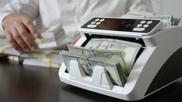 Male hand counting dollar bills. Counting cash in office. Banker counting money. Business man count finance. Office scene with hands hold money. Business finance concept with counting money close up.