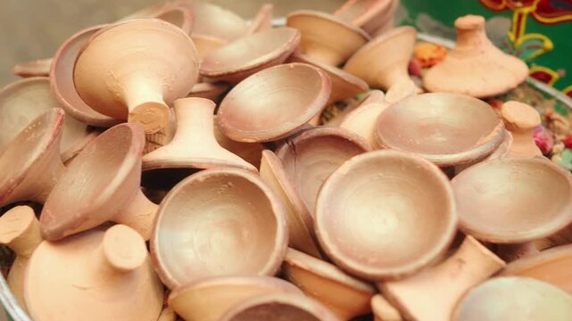 Clay Diyas and Colorful Pottery in Indian Market Display for Diwali Festival Decorations