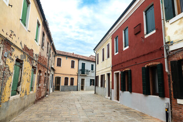 Fototapeta premium Street with old houses in Murano, Venice, Italy
