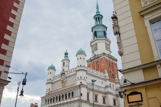 Poznan City Hall close up between old historical houses on Old Town square. Main symbol of polish city, old architecture, Poznan city center.