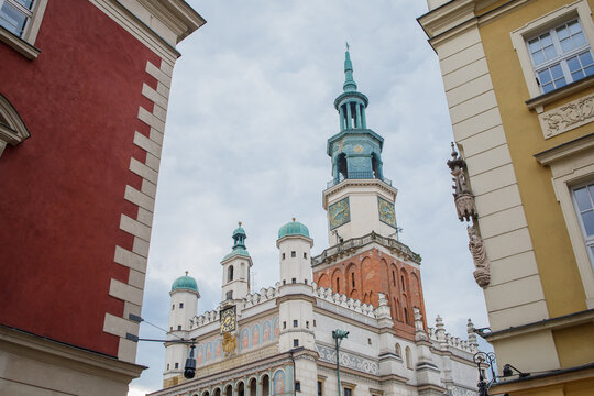 Poznan City Hall close up between old historical houses on Old Town square. Main symbol of polish city, old architecture, Poznan city center.