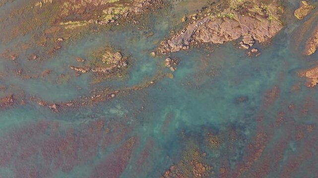 Aerial drone footage of Compton Bay and Brook Chine Beach on the south-west coast of the Isle of Wight, England, showcasing dramatic cliffs, golden sands, turquoise water, and the spectacular coast