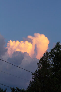 Sunset Sky Over Rural Moldova with Utility Wires and Silhouetted Trees