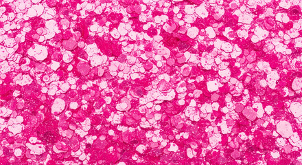 Obraz premium Abstract background featuring vibrant pink and light pink glitter particles.