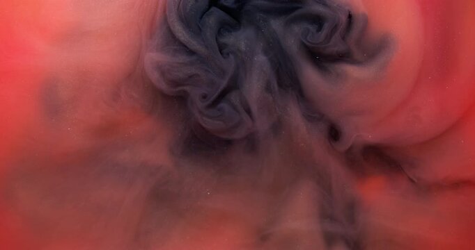 Mist ink. Magic fume. Contrast pigment mix sparkling fluid defocused background. Black red orange dye explosion art color shiny haze.