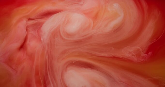 Ink fog. Smoke vortex. Red orange underwater color hot stream spiral round blend. Haze dye texture abstract defocused art background.