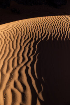 Rippled Sand Dune Patterns at Dusk