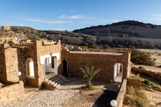 Stone Guesthouse With Mountain Backdrop