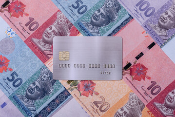 A credit card for contactless cashless payments via a terminal or online. A credit card © chernikovatv