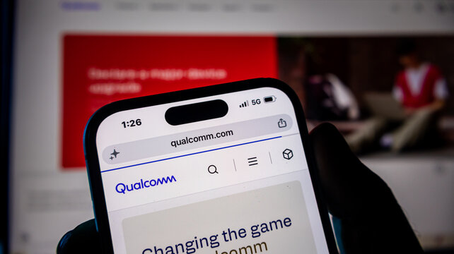 Qualcomm official website displayed on mobile phone browser screen.